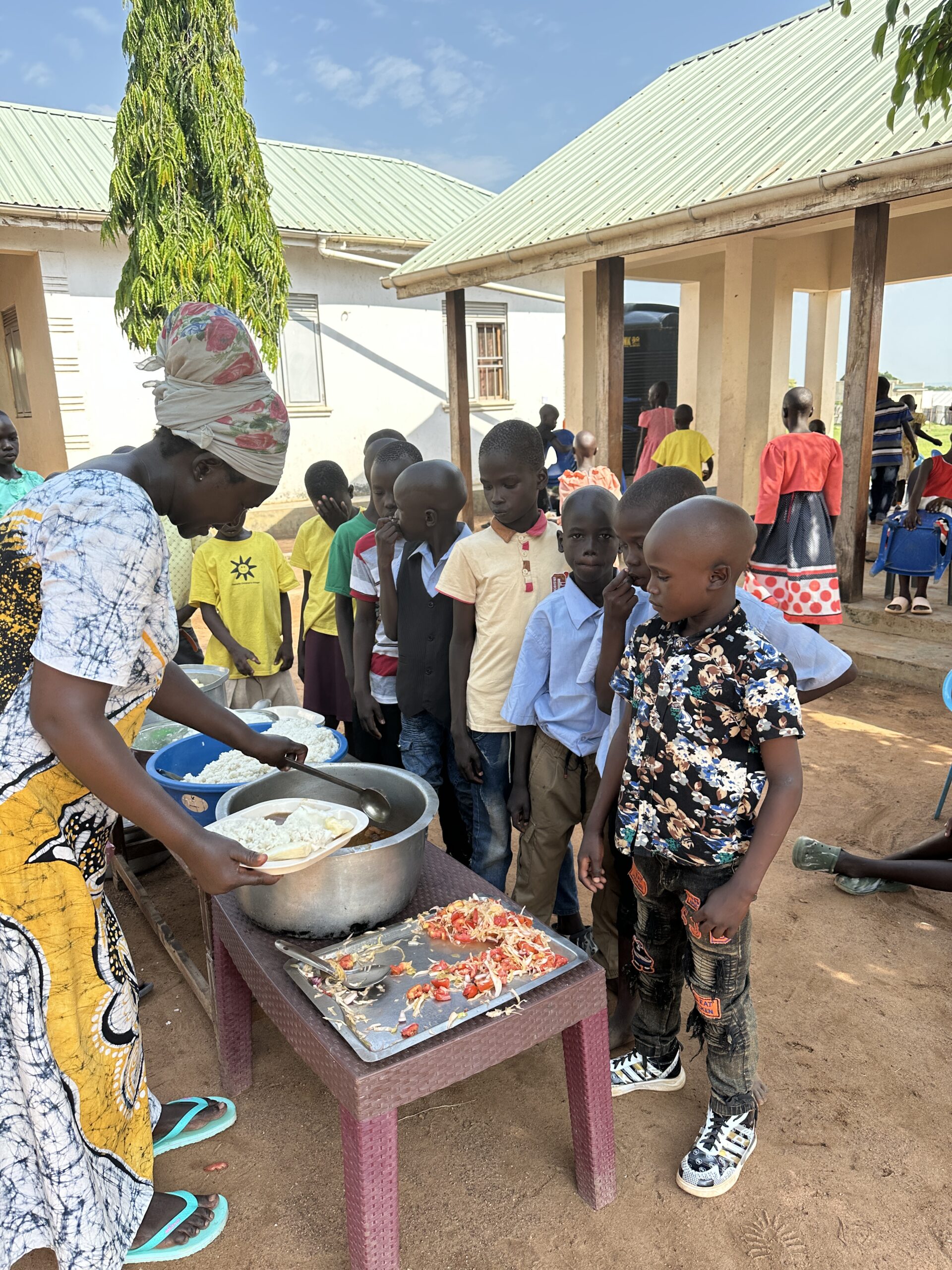Orphans at Amazing Grace feasting after Christian formation